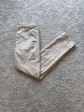 American Eagle Outfitters Super High-Rise Stretch Jeans in Cream